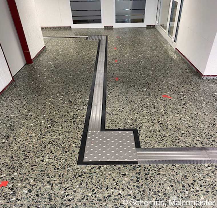 Taktile Leitsysteme - Rillen- und Noppenplatten fuer eine bessere Orientierung im öffentlichen Raum